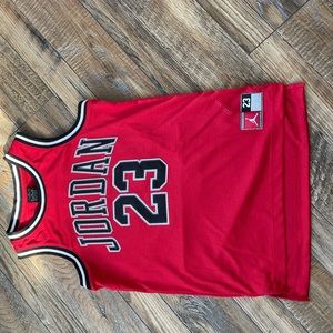 Red, Jordan 23 jersey shirt. Size medium. Have never worn out, only tried on.